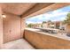 Covered patio with views of the parking lot and surrounding buildings at 3151 Soaring Gulls Dr # 2180, Las Vegas, NV 89128