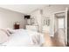Bedroom with wood flooring and a view into an en-suite bathroom and walk in closet at 3323 Bay Horse Ct, North Las Vegas, NV 89032