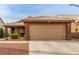 Inviting single-story home featuring a desert-friendly landscape and a two-car garage at 3323 Bay Horse Ct, North Las Vegas, NV 89032