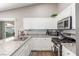 Well-equipped kitchen featuring white cabinets, granite countertops, and stainless steel appliances at 3323 Bay Horse Ct, North Las Vegas, NV 89032
