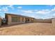Large backyard space with block wall, perfect for customization and outdoor activities at 346 Tigullio Ave, Henderson, NV 89011