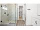 Bathroom featuring glass-enclosed shower with marble tile at 346 Tigullio Ave, Henderson, NV 89011