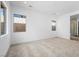 Large bedroom featuring plush carpeting and ample natural light at 346 Tigullio Ave, Henderson, NV 89011