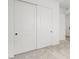 This cozy bedroom has neutral carpet and a closet with sliding doors at 346 Tigullio Ave, Henderson, NV 89011