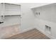 Laundry room with washer/dryer hookups and plenty of shelf space at 346 Tigullio Ave, Henderson, NV 89011