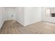 This room has light, wood-look floors and white walls at 346 Tigullio Ave, Henderson, NV 89011