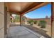 Relaxing covered back patio perfect for outdoor seating and entertaining with desert landscaping at 3544 Tack St, Las Vegas, NV 89122