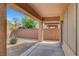 Enjoy the covered back patio with desert landscaping and privacy walls for relaxing outdoors at 3544 Tack St, Las Vegas, NV 89122