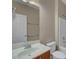 Bathroom with single sink vanity, mirror, tub and tile surround at 3544 Tack St, Las Vegas, NV 89122