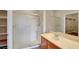 Bathroom featuring modern shower, vanity with sink, and walk in closet at 3544 Tack St, Las Vegas, NV 89122