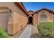 Close-up of the front door of a single-story home with a desert landscape at 3544 Tack St, Las Vegas, NV 89122