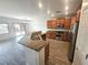 Open concept kitchen featuring granite countertops and stainless steel appliances at 3544 Tack St, Las Vegas, NV 89122