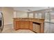 Open kitchen layout featuring a breakfast bar and stainless steel appliances at 3544 Tack St, Las Vegas, NV 89122