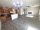 Open concept kitchen and living room with modern finishes and plenty of space at 3544 Tack St, Las Vegas, NV 89122