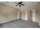 Spacious main bedroom featuring neutral walls, carpet, and an ensuite at 3544 Tack St, Las Vegas, NV 89122
