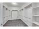 Spacious walk-in closet with shelving and carpeted floor at 3544 Tack St, Las Vegas, NV 89122