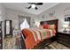 Cozy main bedroom with decorative wall art and a large window at 3752 Calle De Rio Ave, Las Vegas, NV 89115