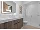 This bathroom boasts modern fixtures, a stylish vanity, and a glass-enclosed shower at 42 Ravenswood Ave, Las Vegas, NV 89141