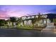 A stylish, two-story home with manicured lawns and stone accents at 42 Ravenswood Ave, Las Vegas, NV 89141