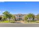 Charming two-story home showcasing lush landscaping and a welcoming entrance at 42 Ravenswood Ave, Las Vegas, NV 89141