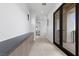 Hallway with wood floors and a large built-in storage cabinet at 42 Ravenswood Ave, Las Vegas, NV 89141