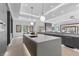 Sleek kitchen with modern cabinets, dual islands, pendant lighting, and stainless steel appliances at 42 Ravenswood Ave, Las Vegas, NV 89141