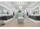 The main bathroom features dual vanities, a modern tub, and a spacious glass-enclosed shower at 42 Ravenswood Ave, Las Vegas, NV 89141