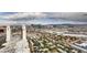 Expansive aerial view showcasing The Palms Casino Resort and the vibrant Las Vegas cityscape against a cloudy sky at 4381 W Flamingo Rd # 5220, Las Vegas, NV 89103