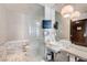 Contemporary bathroom with dual sinks, marble accents, and a separate toilet area at 4381 W Flamingo Rd # 5220, Las Vegas, NV 89103