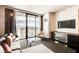 Stylish living room with a comfortable sofa, city view balcony, TV, and sleek furniture, perfect for relaxing at 4381 W Flamingo Rd # 5220, Las Vegas, NV 89103