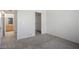 Carpeted bedroom with ensuite bathroom and walk-in closet at 45 Maleena Mesa St # 223, Henderson, NV 89074
