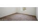 Bedroom featuring neutral carpet, baseboards and a window for natural light at 45 Maleena Mesa St # 223, Henderson, NV 89074