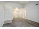 Spacious living area featuring neutral carpet, freshly painted walls, and bright, natural lighting at 45 Maleena Mesa St # 223, Henderson, NV 89074