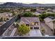Beautiful aerial view of home in a residential neighborhood with mountain views at 4737 Barcelona Ridge Ct, Las Vegas, NV 89129