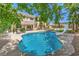 An outdoor pool with a slide and lounge chairs at 4737 Barcelona Ridge Ct, Las Vegas, NV 89129