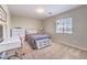 Bedroom with a bed, desk, and dresser at 4737 Barcelona Ridge Ct, Las Vegas, NV 89129