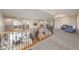 Expansive loft offering versatile living space with wrought iron railings and ample room for relaxation at 4737 Barcelona Ridge Ct, Las Vegas, NV 89129