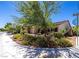 Landscaped house exterior featuring lovely flowers and a well-maintained yard at 5170 Agio Ave, Pahrump, NV 89061