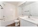 Clean bathroom featuring a tub-shower combination, white vanity, and sleek fixtures at 5340 Santa Fe Heights St, North Las Vegas, NV 89081