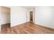 Bedroom with walk-in closet and wood-style flooring at 5340 Santa Fe Heights St, North Las Vegas, NV 89081