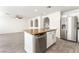 Bright kitchen features granite countertops, stainless steel appliances, and an open layout to the living area at 5340 Santa Fe Heights St, North Las Vegas, NV 89081