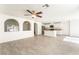 Bright and spacious, this open layout has the living room, kitchen, and arched design features at 5340 Santa Fe Heights St, North Las Vegas, NV 89081