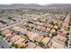 Scenic aerial view of a sprawling residential community with mountains in the background at 5526 Spruce Hill Ct, Las Vegas, NV 89148