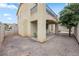 Backyard featuring a patio, landscaping, and two-story home at 5526 Spruce Hill Ct, Las Vegas, NV 89148