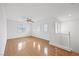 Spacious bedroom with natural light, wood floors, and a ceiling fan at 5526 Spruce Hill Ct, Las Vegas, NV 89148