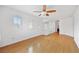 Bright, open space with wood flooring, plantation shutters, and a ceiling fan at 5526 Spruce Hill Ct, Las Vegas, NV 89148