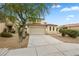 Charming two-story home with a two-car garage and low-maintenance landscaping at 5526 Spruce Hill Ct, Las Vegas, NV 89148