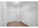 Walk-in closet with carpet, shelving, and a door at 5526 Spruce Hill Ct, Las Vegas, NV 89148