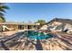 Inviting backyard with an in-ground pool and spacious patio at 5905 Paseo Montana, Las Vegas, NV 89108