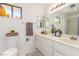 Well-lit bathroom with dual mirrors, ample vanity space, and a decorative theme at 5905 Paseo Montana, Las Vegas, NV 89108